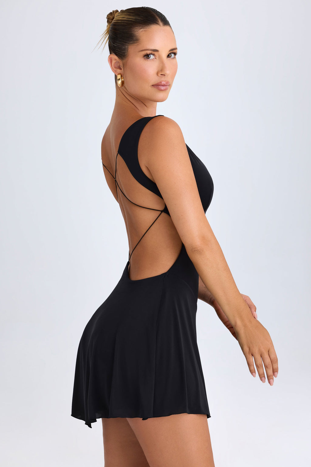 Chic Plunge Cut-Out Mini Dress in Black