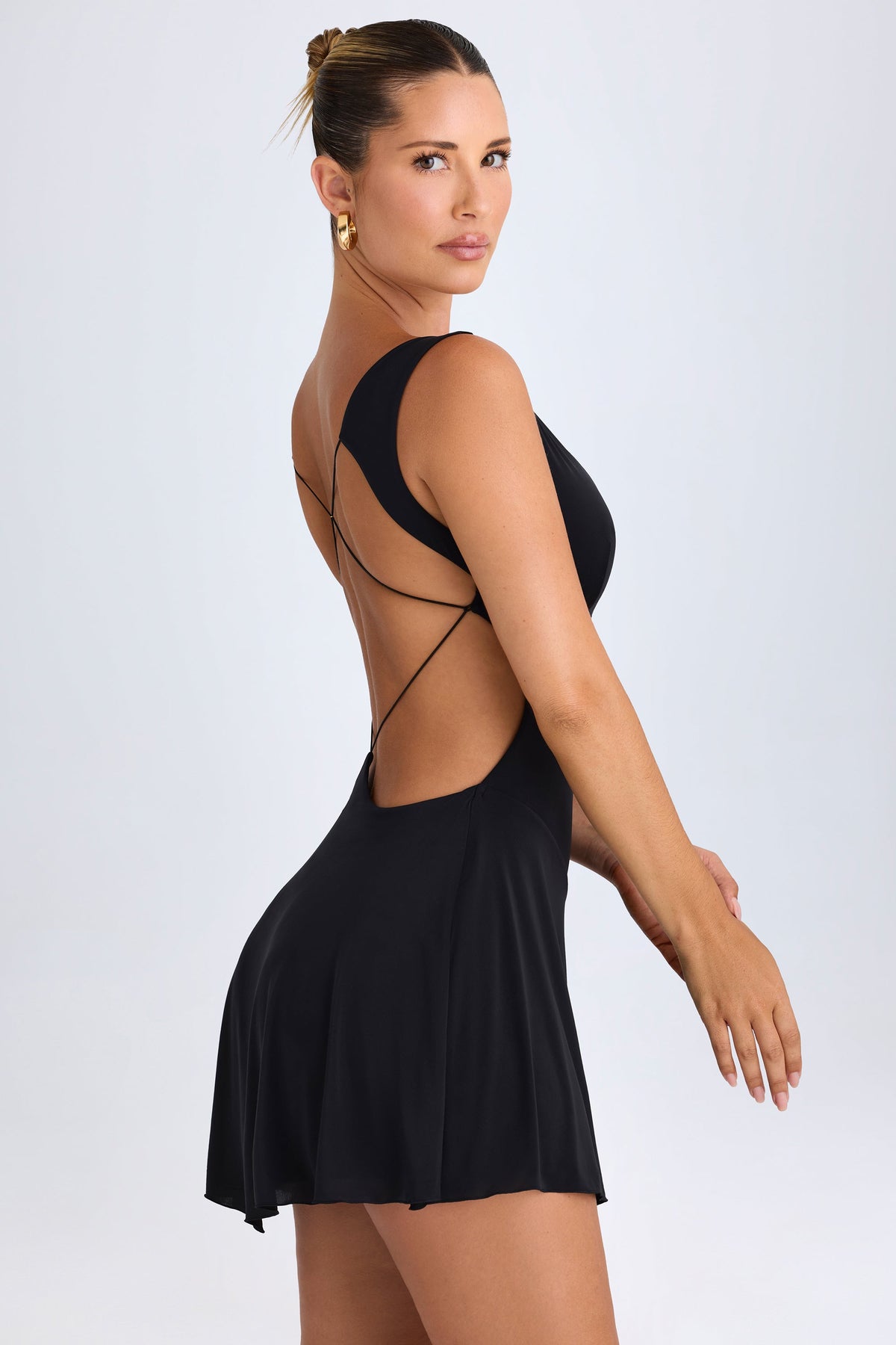 Chic Plunge Cut-Out Mini Dress in Black