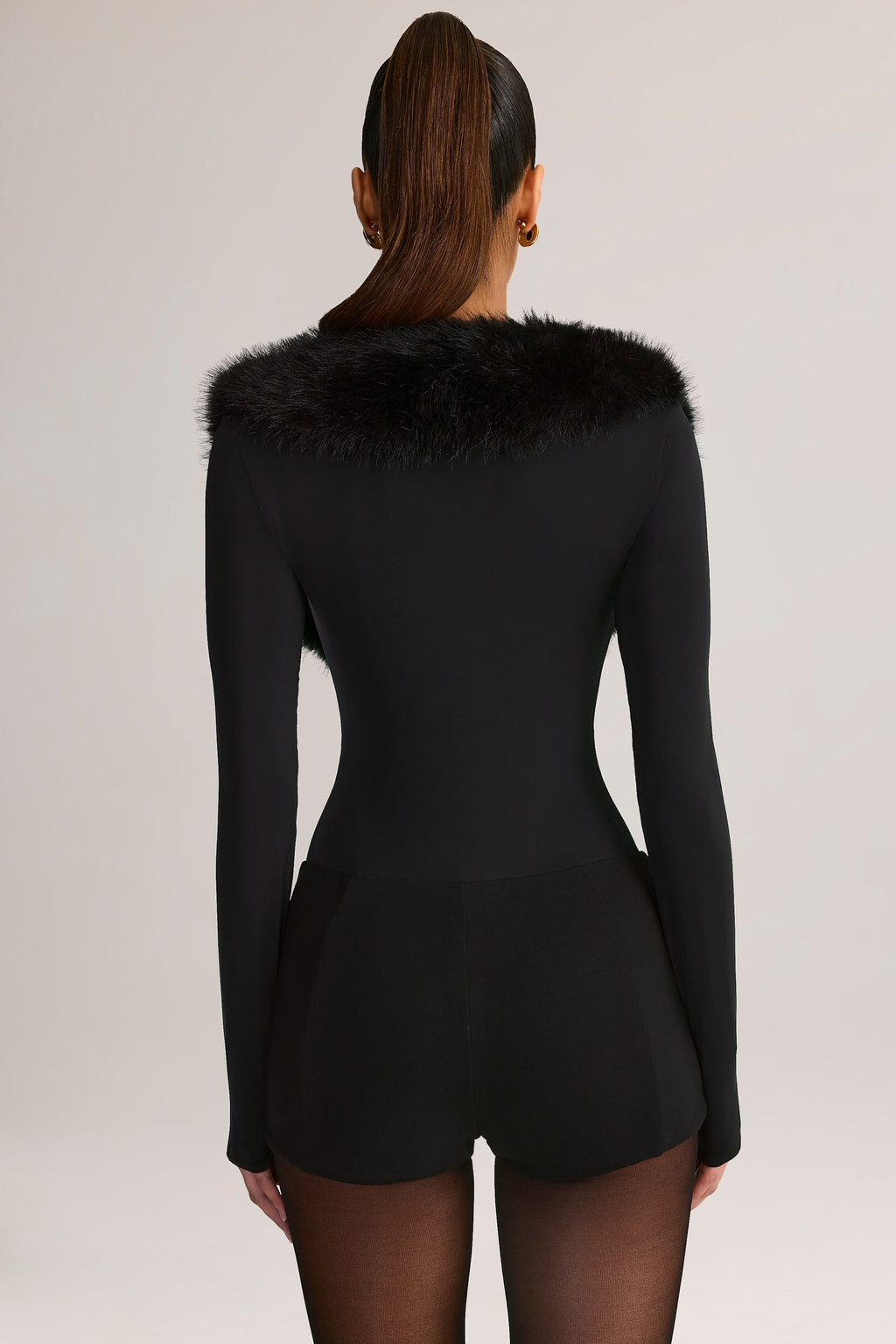 Chic Faux Fur-Trim Corset Playsuit in Black
