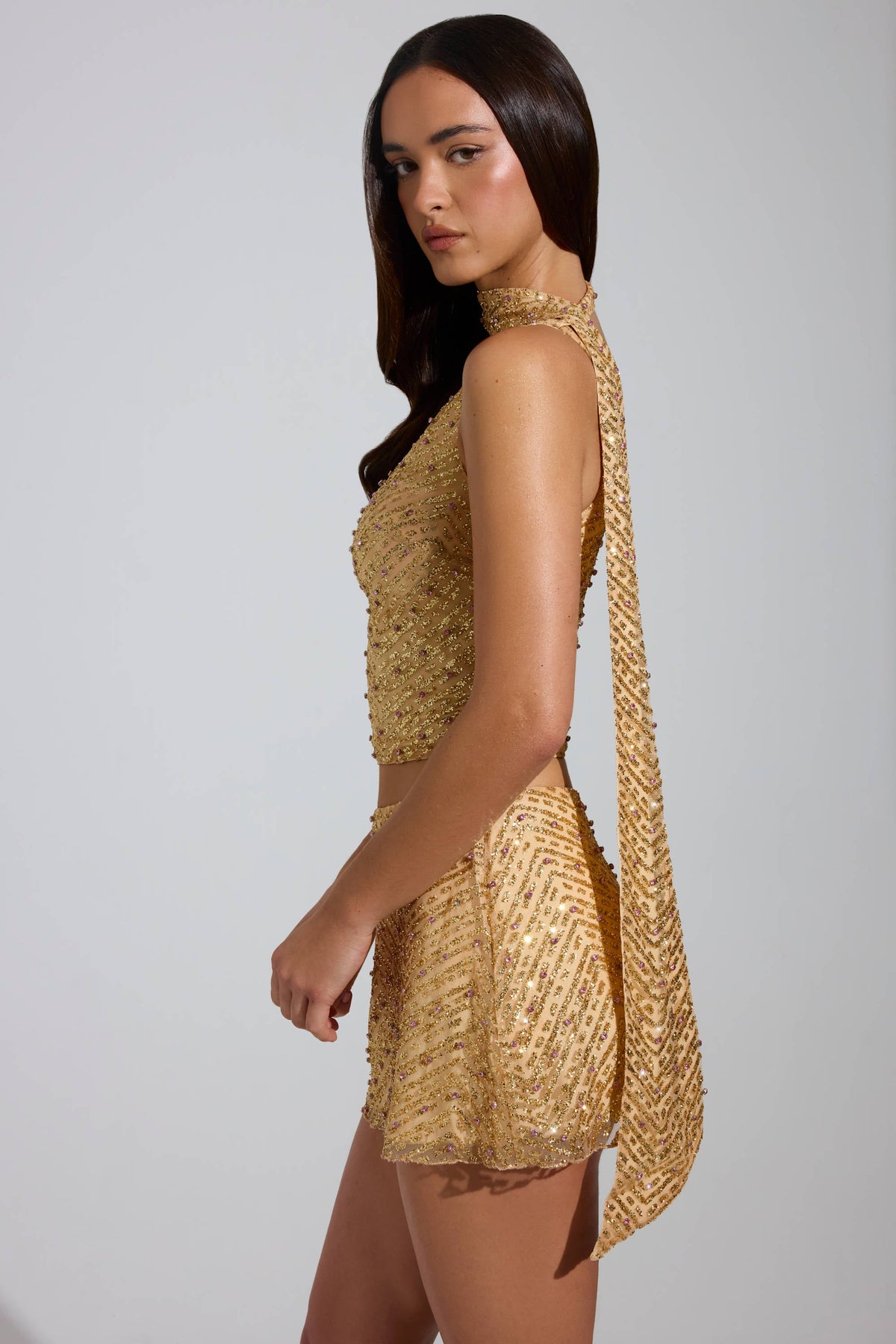 Chic Embellished Asymmetric Scarf-Detail Top in Gold