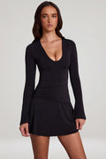 Chic Soft Jersey Scoop-Neck Flared Mini Dress in Black