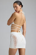 Chic Embellished Cross-Strap Bikini Top in Ivory