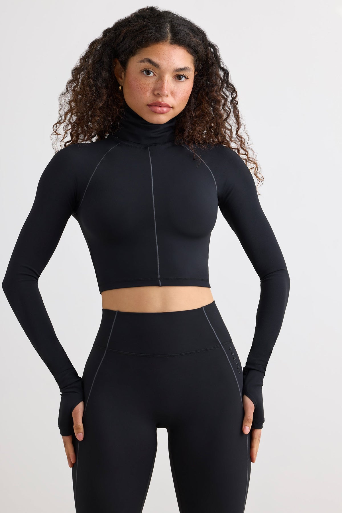 Chic Soft Active Turtleneck Crop Top in Black
