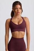 Chic Super Sculpt Seamless Crossback Sports Bra in Burgundy