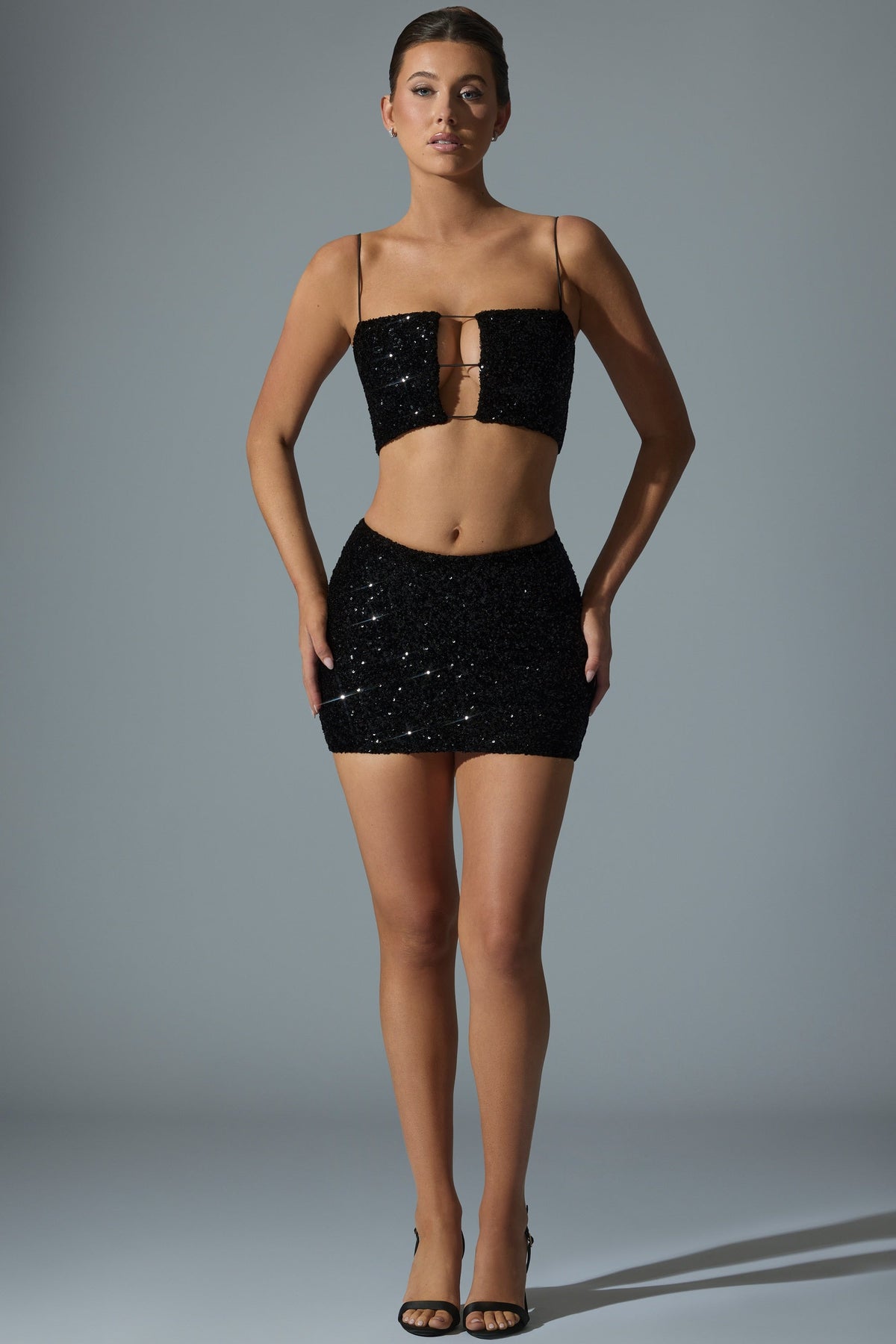 Chic Embellished Mid-Rise Mini Skirt in Black