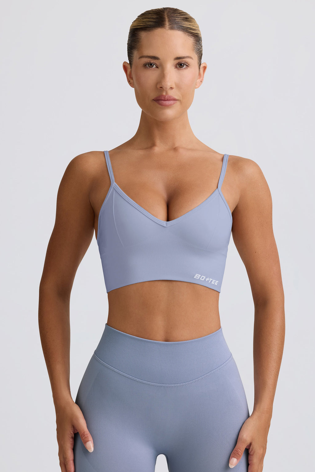 Chic Define Luxe V-Neck Sports Bra in Blue Grey