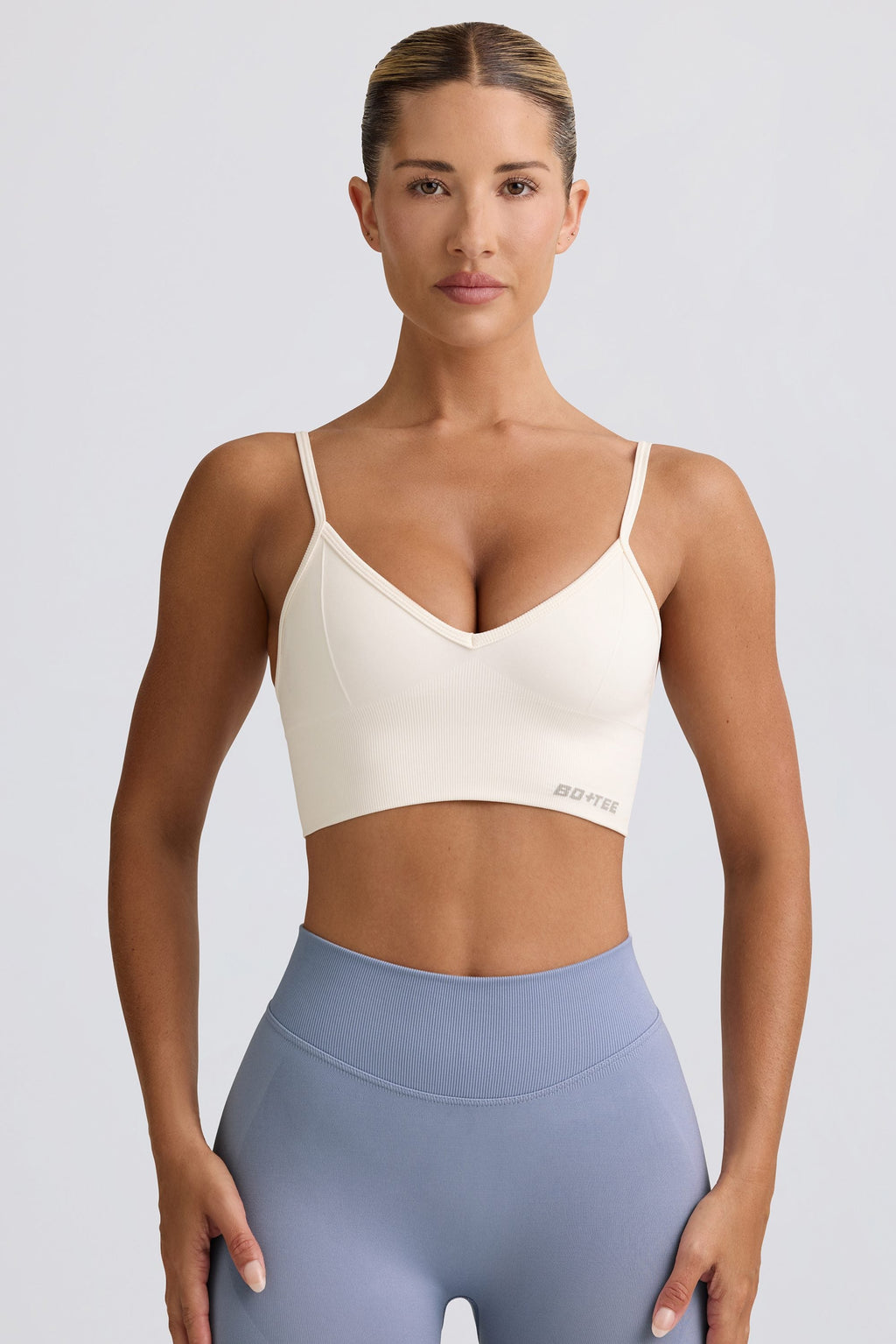 Chic Define Luxe V-Neck Sports Bra in White