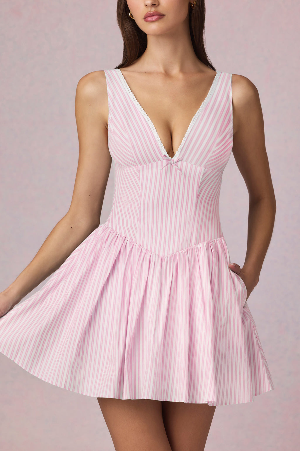 Chic Bow-Detail A-Line Mini Dress in Soft Mauve Stripe