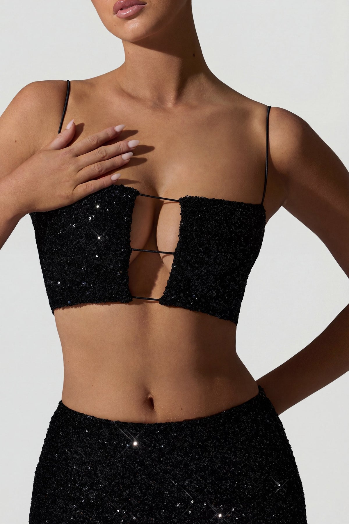 Chic Embellished Cut-Out Crop Top in Black